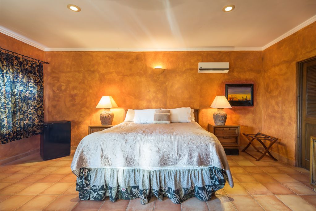 Upper room bed at Loreto Playa Casa